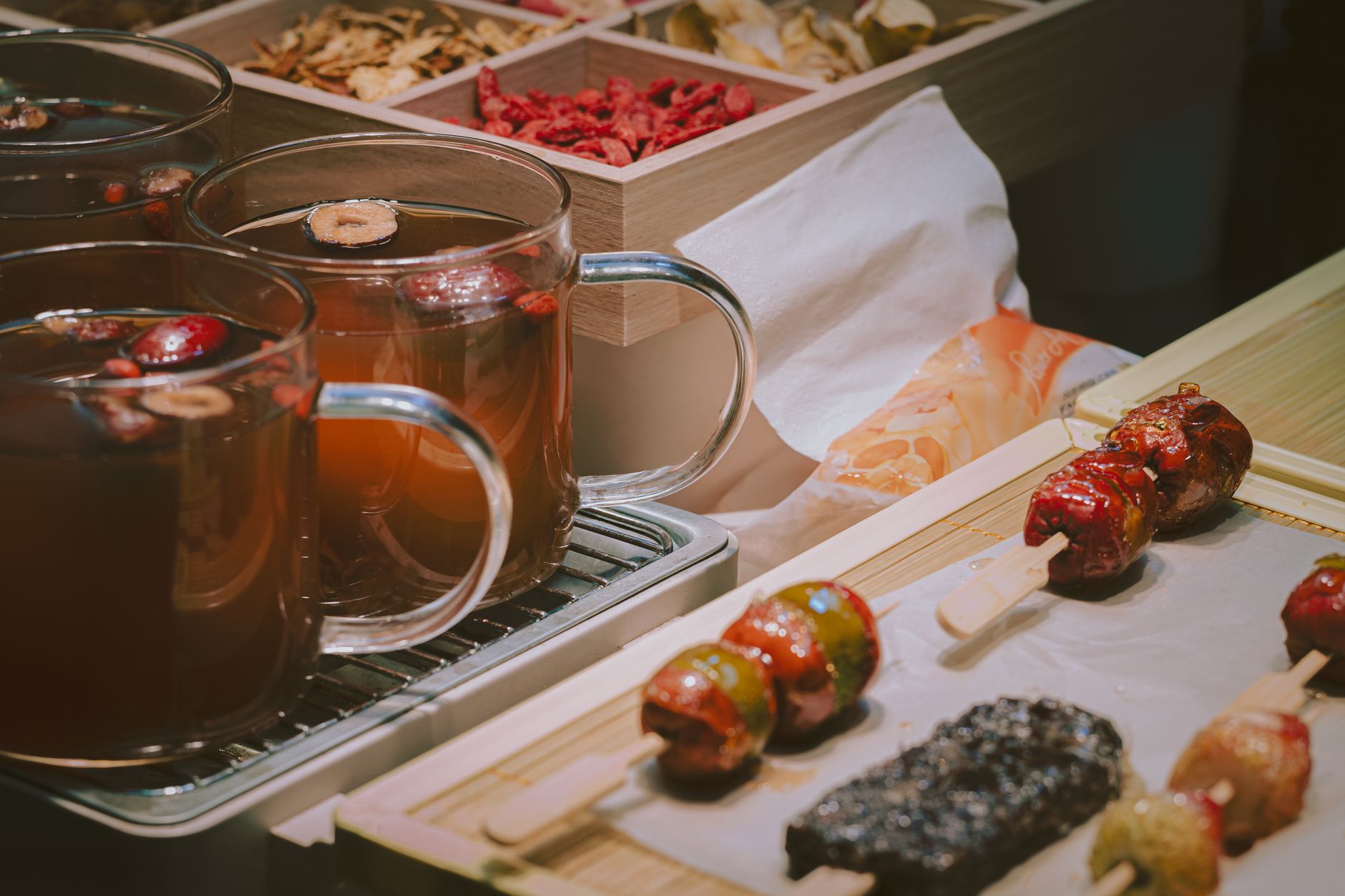 goji berries red dates TCM – warm tea in a clear glass cup