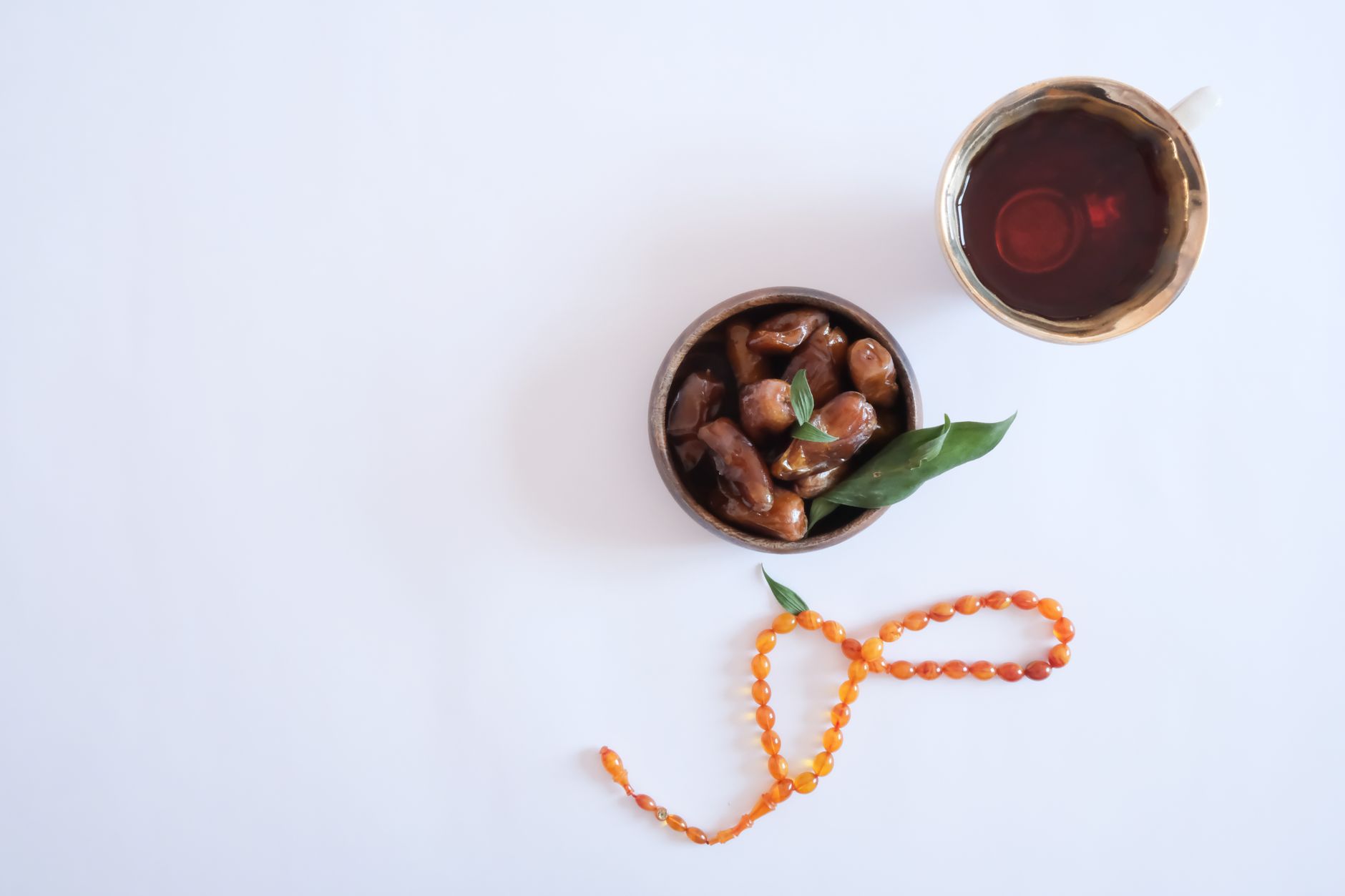 Chinese red dates – bowl of dried red dates with tea.