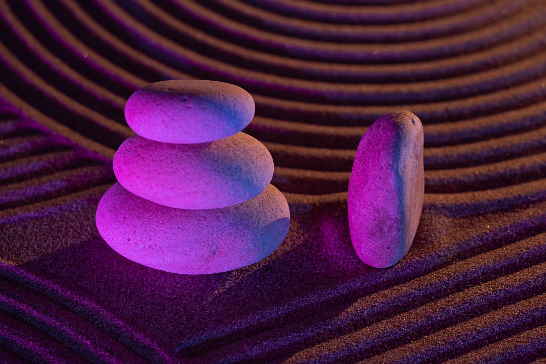 Yin and Yang TCM – Balanced stones in a zen garden symbolizing harmony.