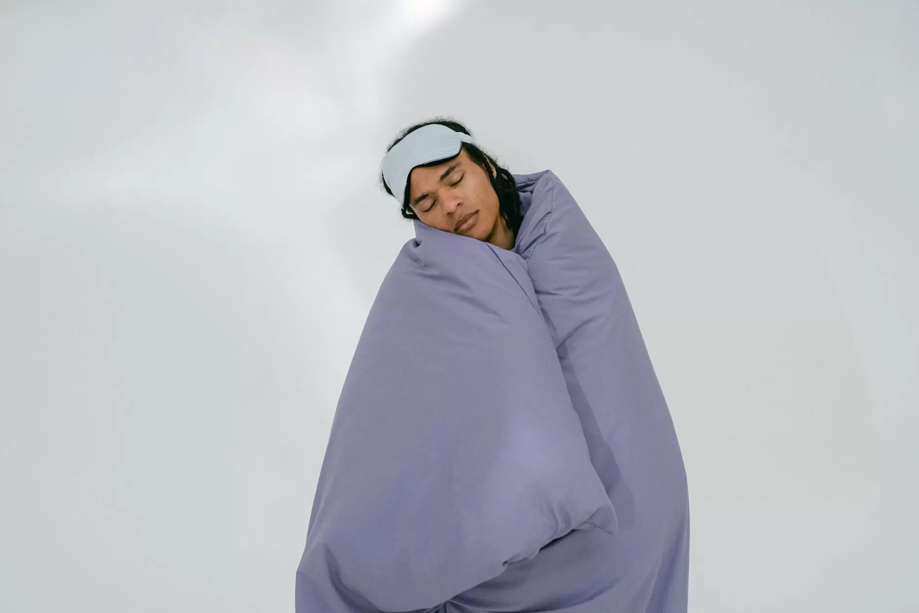 cover stomach while sleeping – person asleep with blanket over midsection