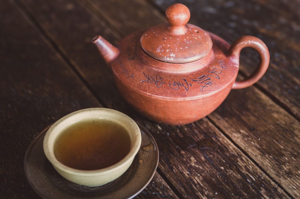 Chinese herbal tea – brewing in a traditional clay pot.